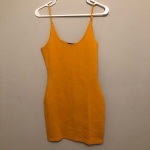 Tight mustard yellow dress